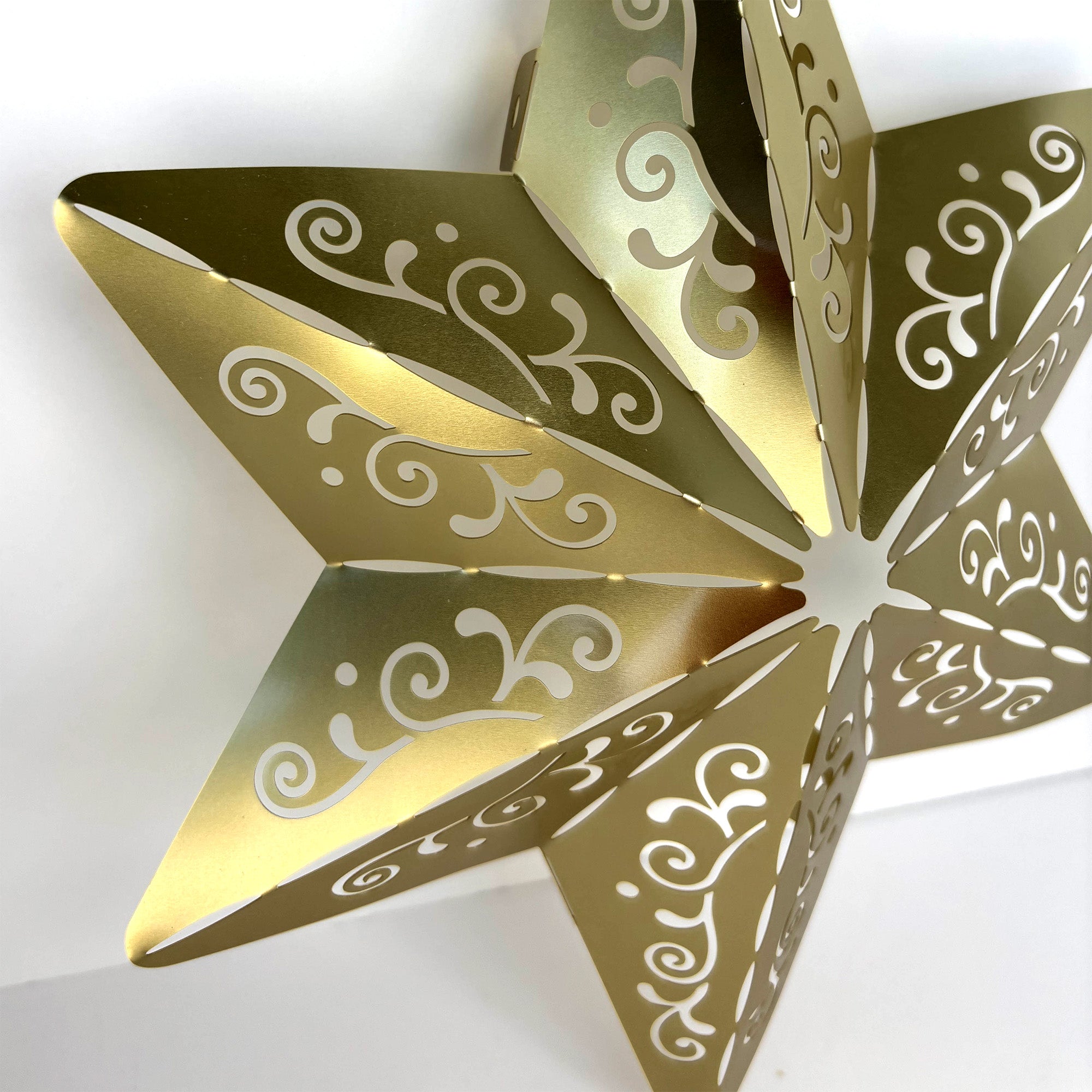 Detail of Gold Metal Christmas Star Tree Topper