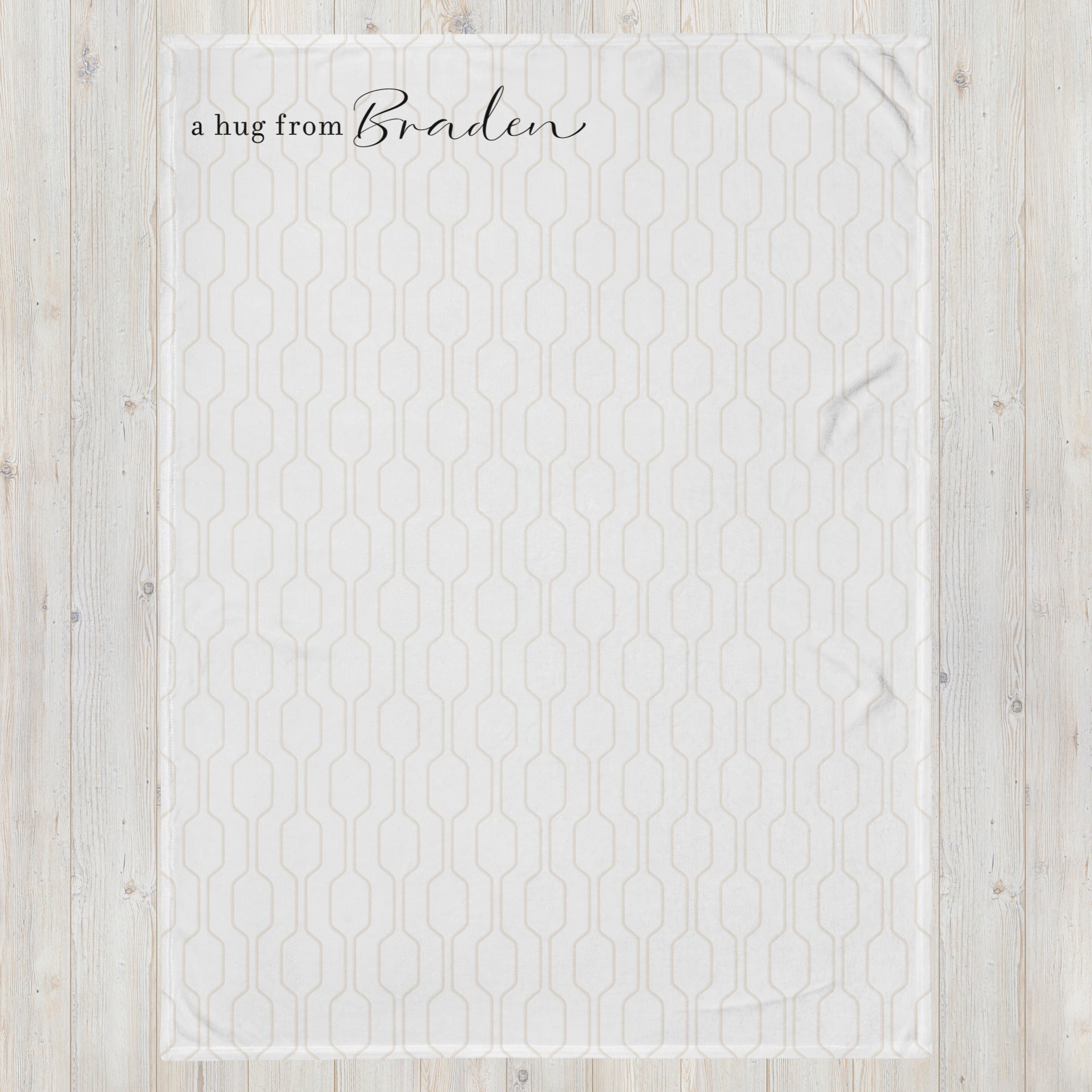 Send a hug support gift blanket with a taupe mid century modern pattern and the words "a hug from” with personalized name. Thinking of you gift for long distance relationship.