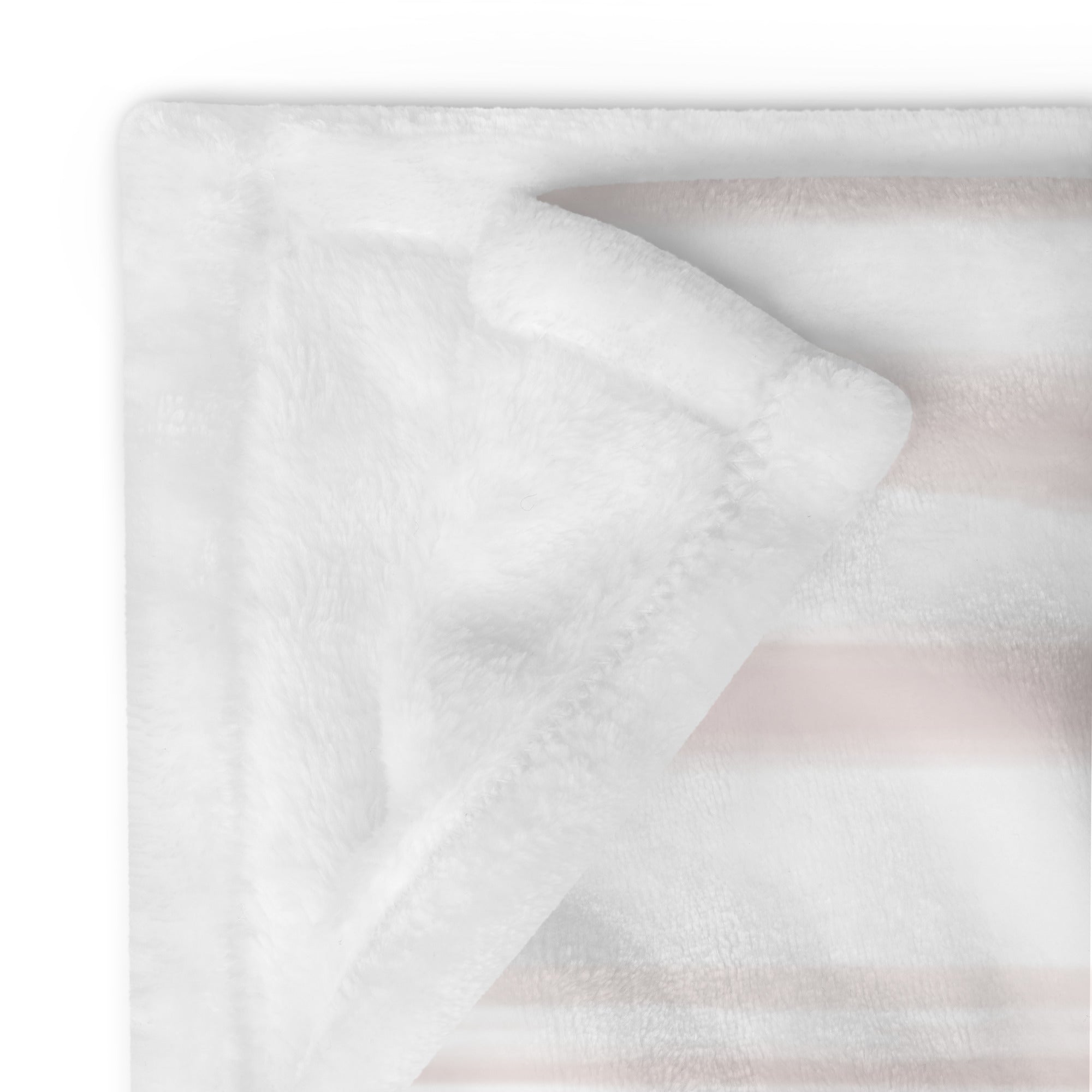 Detailed image of stitching and corner of personalized extra large blanket with light pink contemporary stripes. Blanket has text that says, "a hug from" with a personalized name. Farewell gift for moving away.