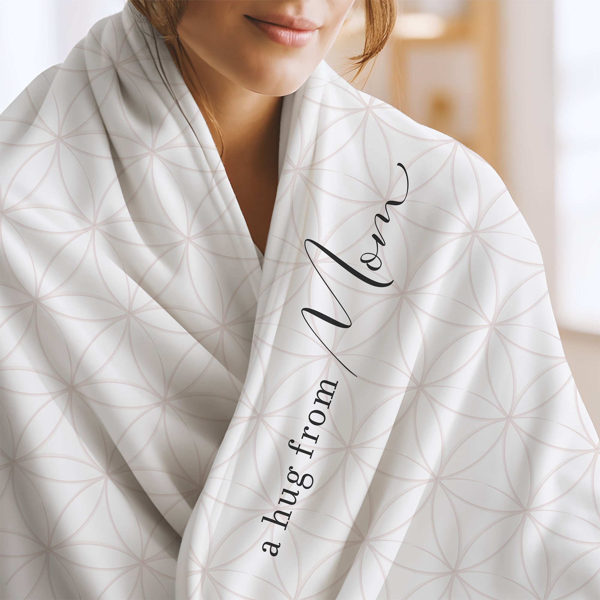 Send a hug extra soft blanket with white and pink florals and the words "a hug from Mom.” Sympathy gift for loss of daughter, son, mother, father.
