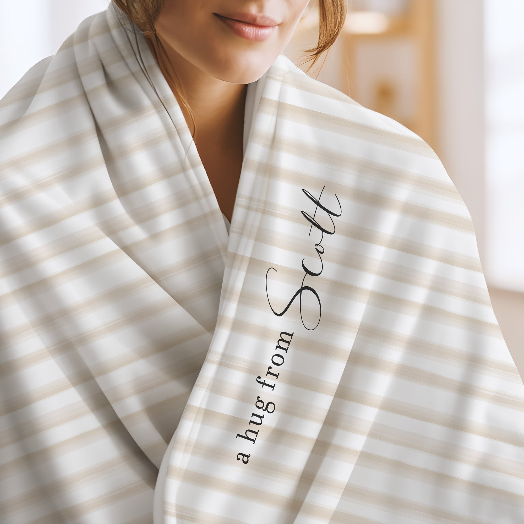 Send a hug extra soft blanket with white and taupe stripes and the words "a hug from Scott.” Thinking of you gift for long distance relationship.