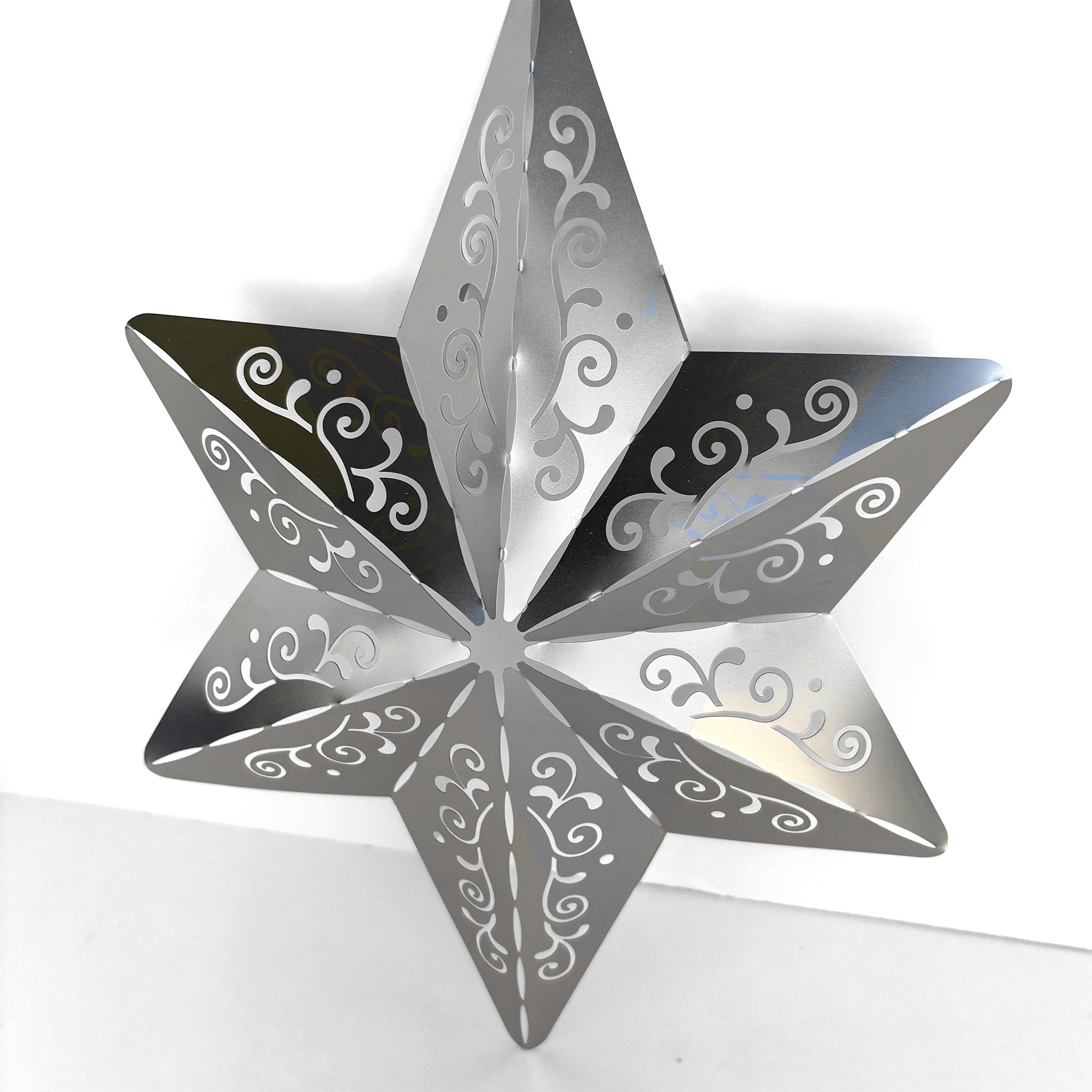 Detail of Silver Metal Christmas Star Tree Topper