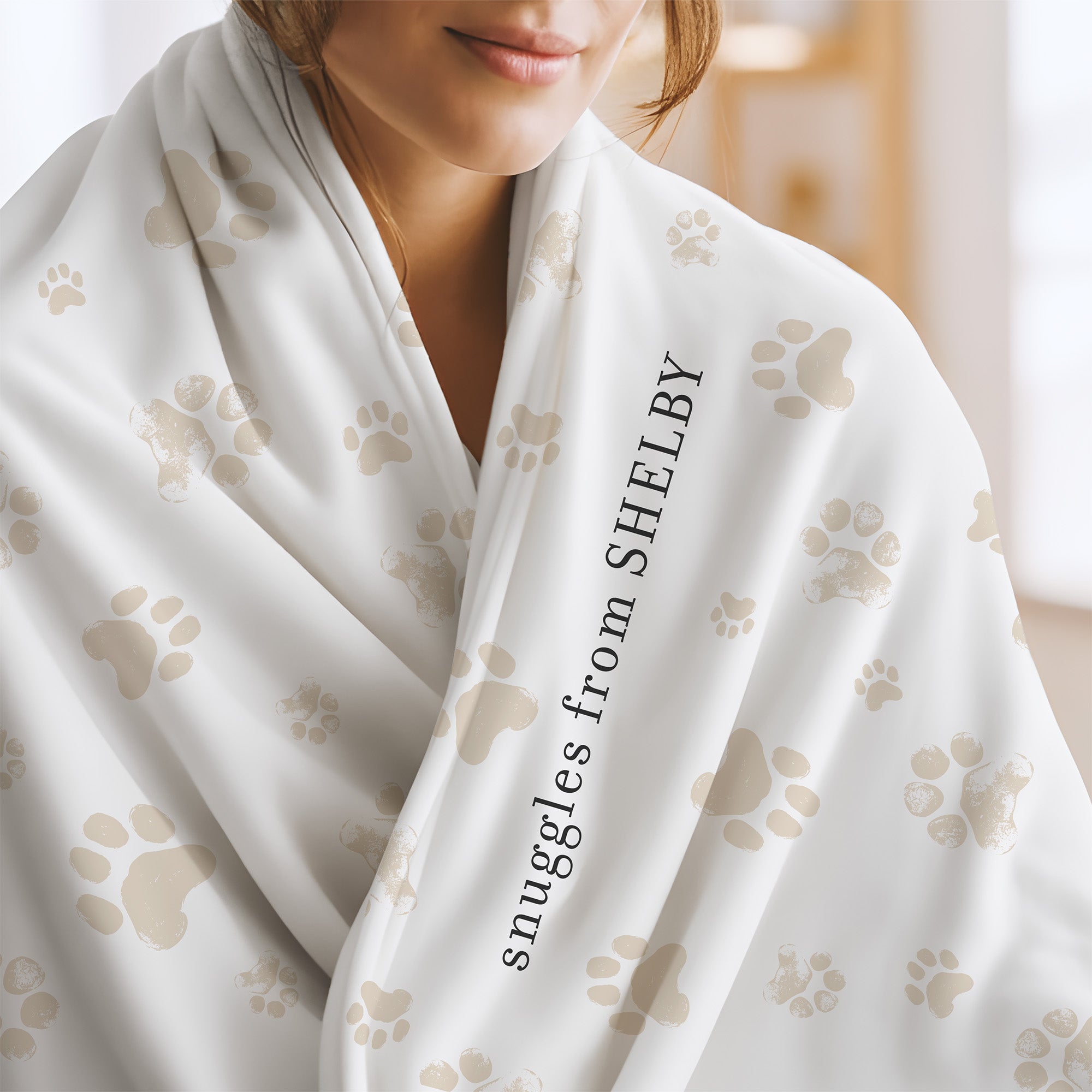 Send a hug memorial blanket with white and taupe paw print pattern and the words "snuggles from Shelby.” Sympathy gift for loss of pet.