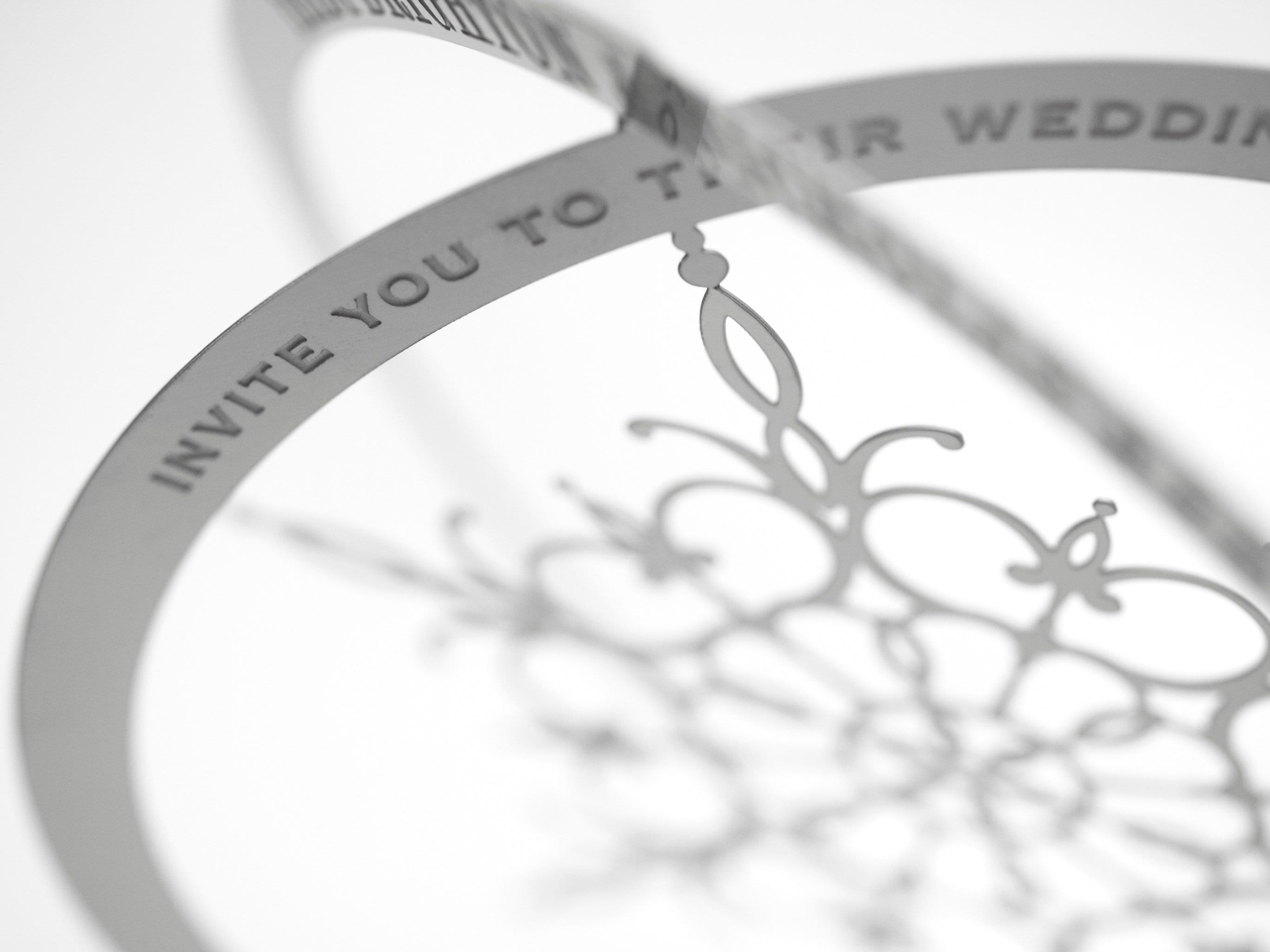 3D Wedding Invitations Made from Metal that Transform into Christmas Ornaments