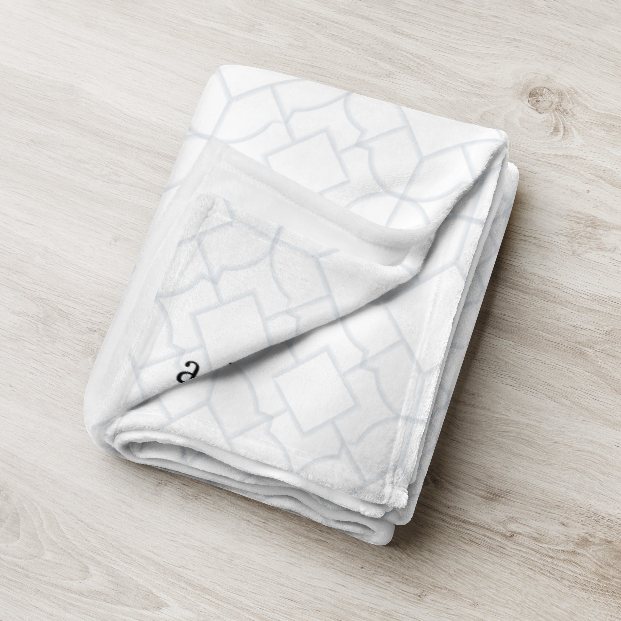 Folded blanket with blue contemporary pattern. Blanket has text that says, "a hug from Papa.” Support gift for granddaughter or grandson.
